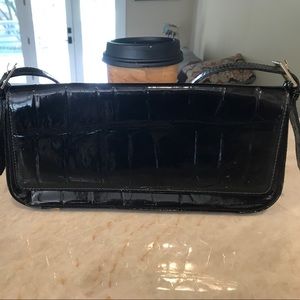 Escada patten leather clutch.